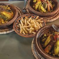 Veg tagine, couscous and fries at Bakchich Cafe in Marrakech