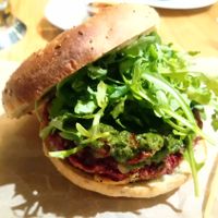 Great combination of lentil burger with roquette leaves. at Avocado Cafe - Chistoprudny in Moscow