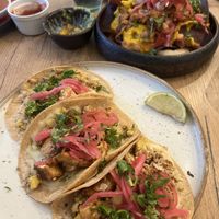 tofu tacos and nachos with oyster mushroom and homemade nacho cheese 😋  at TU MEXICO in Krakow