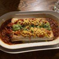 Vegan enchilada with vegan chicken and vegan cheese with a spicy salsa  at El Tio in South Shields