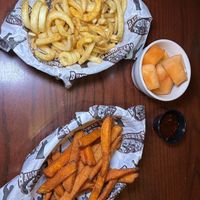 Sweet Potato fries with chili sauce, fruit melody, curly q fries   at Baumhower's Victory Grille in Mobile