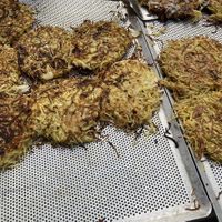 Potato pancakes with onions. Does not contain eggs, cheese.  at Old Town Market in Annecy