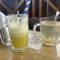 Fresh Pineapple drink and a ginger lemon tea. Both were exceptional   at OM Freedom Cafe in Rishikesh