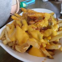 chilli cheese fries at Grasshopper - College St in Toronto
