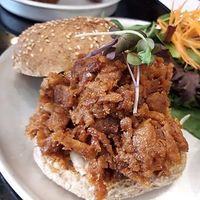 pulled pork burger with side salad  at Grasshopper - College St in Toronto