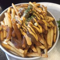 Japanese curry poutine 😍 at Grasshopper - College St in Toronto