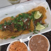 Street tacos! Added rice and beans  at The Green Tongue in Fort Worth