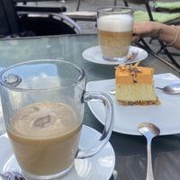 Mango cake and iced cappucino with oat milk   at Delicious Raw by Gabriela Oltean in Brasov