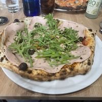 Vegan mortadella
San Marzano tomato, vegan mozzarella, vegan mortadella and truffle.
  at Spiga Napoletana in Toledo