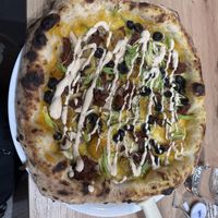 Vegetable pizza with pumpkin sauce and almond cream  at Spiga Napoletana in Toledo