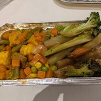 Vegan surprise bag from Too good to go ( noodles, rice, sweet and sour tofu, stir fry broccoli) at Beijing Dumplings & Chinese - Kiosk in East London