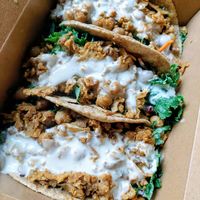Spicy cauliflower tacos, large portion on whole wheat pita at Naked Lunch in Bryn Mawr