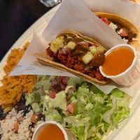 Taco platter -- let's you sample 3 different tacos. The black beans and rice were excellent. at Tacotarian - Miracle Mile in Las Vegas