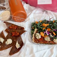 Ravioli and pizza+saladd  at Conscious Kitchen Atx in West Lake Hills