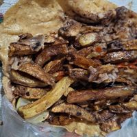 Mix de hongos, arroz, frijolitos, papitas y aguacate con rorrilla hecha a mano 😋🌮🍄🫘🍚🍟 at Hambre? Antojería Mexicana in Puebla