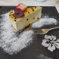 Mango cheesecake at Isha Patisserie in Leicester