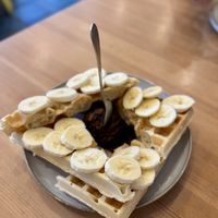 Vegan waffle with vegan Nutella topping (nuts and dates)  at Klubokawiarnia Ptaszyna in Warsaw