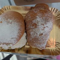 Creamy pistachio pastry and marmalade croissant at Panificio Brizzolari in Peschiera Del Garda