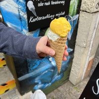 Mango + lime and basil scoops on a waffle cone  at Ice Kitchen in Leipzig
