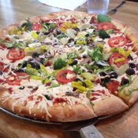 Mega Veggie pizza, vegan style. Jusk for vegan cheese and nix the butter and parmesan on the crust. at Mellow Mushroom in Chattanooga