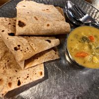 Lunchtime veg curry with 3 chapatis. 85 rupees. They give you extra curry if you need. You need! Lovely taste!  at Gokul Oottupura in Kochi