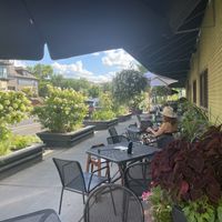 Lovely outdoor seating with flower boxes    at French Meadow Bakery & Cafe in Minneapolis