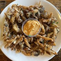 Shroomy Calamari with chipotle sauce (deep fried oyster mushrooms) 💚  at French Meadow Bakery & Cafe in Minneapolis