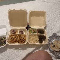 Tabbouleh, fries, hummus, falafel, and pita  at Ramallah - Gastropark in Managua