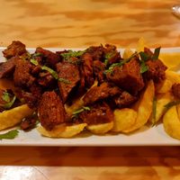 Zorza con patatas at Entre Pedras in Santiago De Compostela