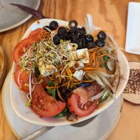 Salad with vegan cheese at Entre Pedras in Santiago De Compostela