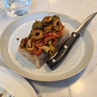 Fried peppersz capers and olives on toast at Upstairs at Anley Street  in Jersey