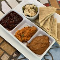 MEZE PLATE
tomato chutney, muhammara, carrot-miso hummus,
giardiniera, housemade naan | 13 v at Robin's Restaurant in Cambria