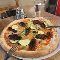 Pizza with vegan cheese at Pizzerija In Gostilna Matiček in Radovljica