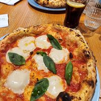 Margherita with vegan cheese in the front and with dairy cheese in the back at Sud in Riva Del Garda