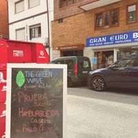 Go up the stairs to find the restaurant  at The Green Wave  in San Vicente De La Barquera