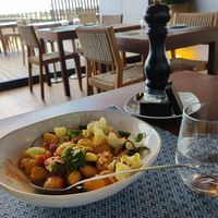 Gnocchi in tomato sauce with cauliflower and toasted almond at Chá Com Água Salgada in Manta Rota