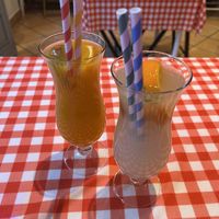 lychee (right) and mango (left) drinks  at Cmočkarna - Dumpling Lady in Ljubljana