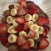 Vegan Ube Bubble Waffle with bananas and strawberries   at Mainely Juice in Bangor