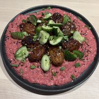 Baked potatoes with bean and beet saucee  at Colibri in Vilnius