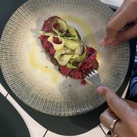 HUMMUS TOST CON ZUCCHINE MARINATE   at Ria Caffetteria Pasticceria in Solaro
