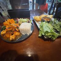 Fried tofu in tomato sauce; vegan dumpling cake    at Ngư Restaurant - Vietnamese Cuisine & Vegan Food  in Hanoi