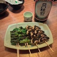Green chilli and mushroom skewers at Tomelu in Seoul