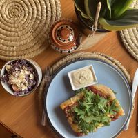 Homemade pizza, chickpea mayo, slaw with red cabbage and smoked tofu- delish  at Folks Cafe in Edinburgh