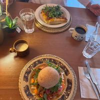 Sloppy Folks and pizza, a flat white with oat milk and an americano. Everything was just delicious! at Folks Cafe in Edinburgh