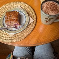 Black forest dark chocolate cake and oat milk hot chocolate at Folks Cafe in Edinburgh