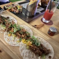 Jackfruit tacos! It comes with 3 different types of sauces.   at Seven Sports Bar - NH Collection  in Dubai