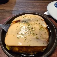 Okonimyaki with ch**se at Izakaya Gonta Hiroshima in Hiroshima