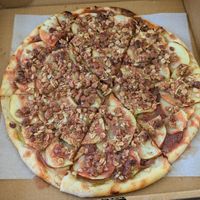 Dessert apple pizza on house made sourdough crust. at Vibrissa Beer  in Winchester