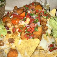 Nachos with guacamole, vegan cheese, and salsa   at The Head of the River  in Oxford
