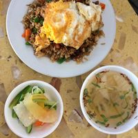 Fried rice comes with pickles and soup at Sir Si Pha in Kampong Cham